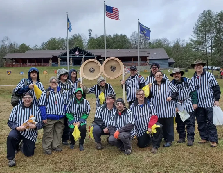 SWC - winter camping training for Scout leaders - image showing a patrol in costume during the closing assembly